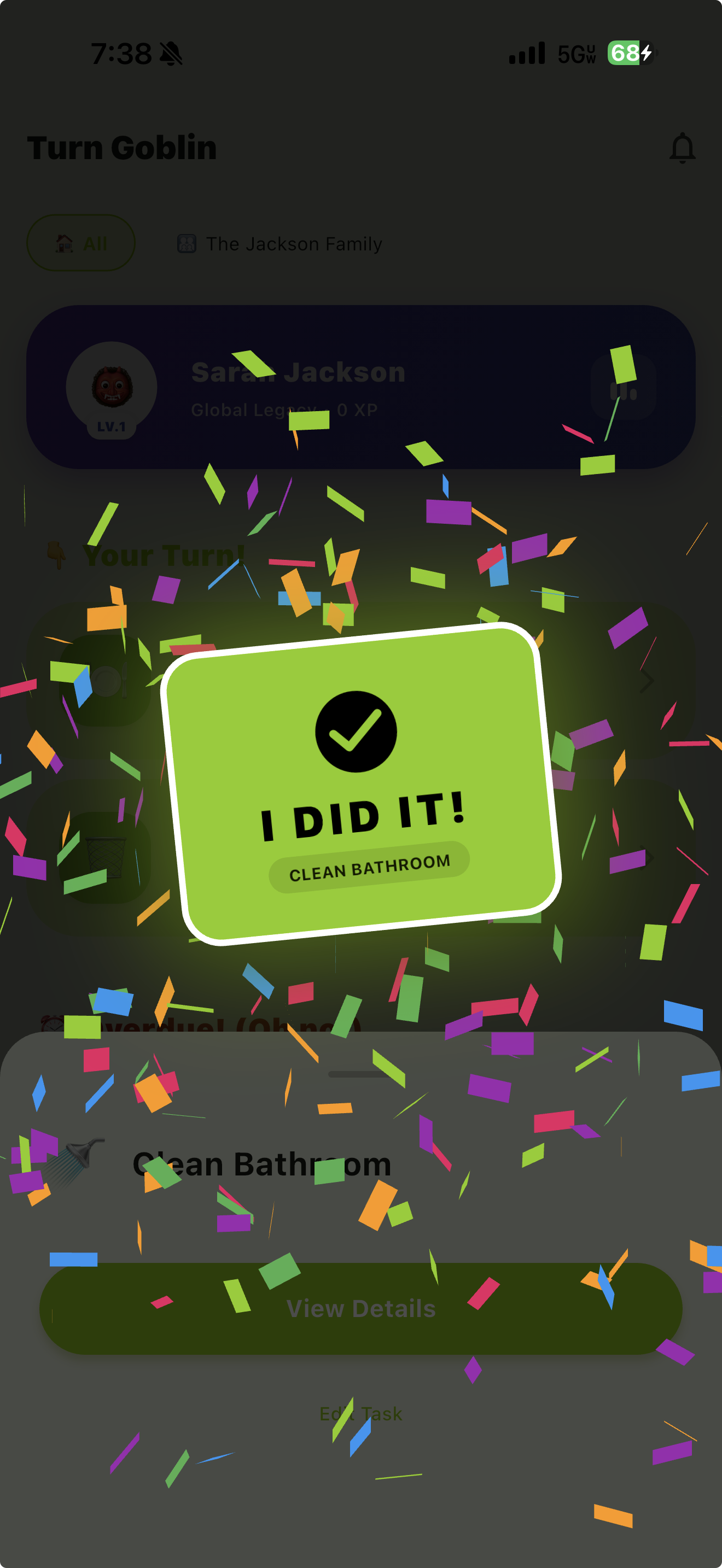 Task completion celebration with I DID IT card, confetti animation, and Clean Bathroom task